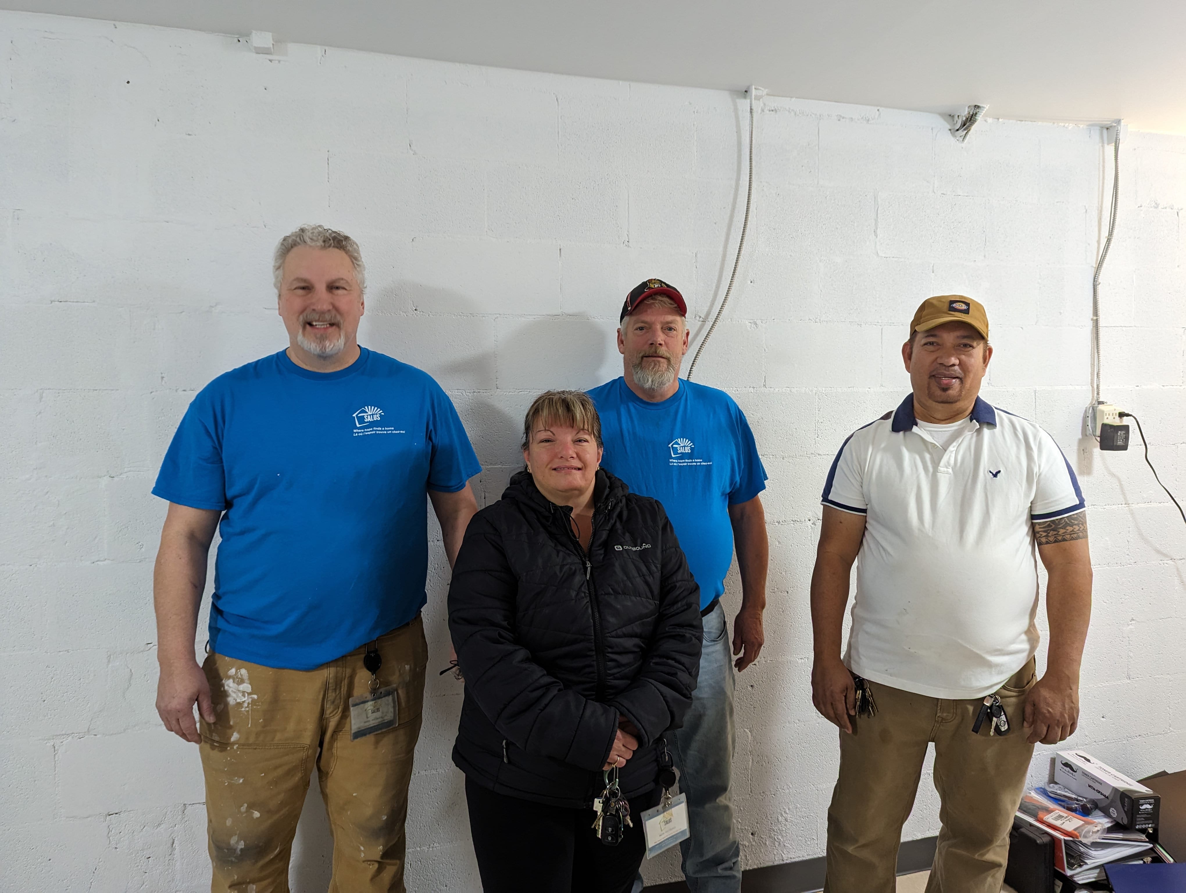 Picture of 4 members of the maintenance crew